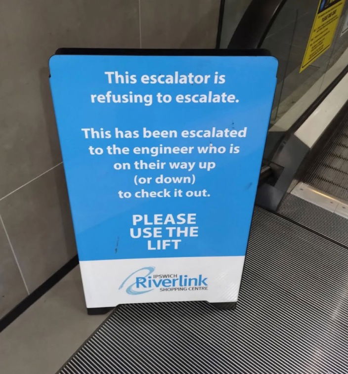 elevating-engagement-humor-and-clarity-in-escalator-signage.png